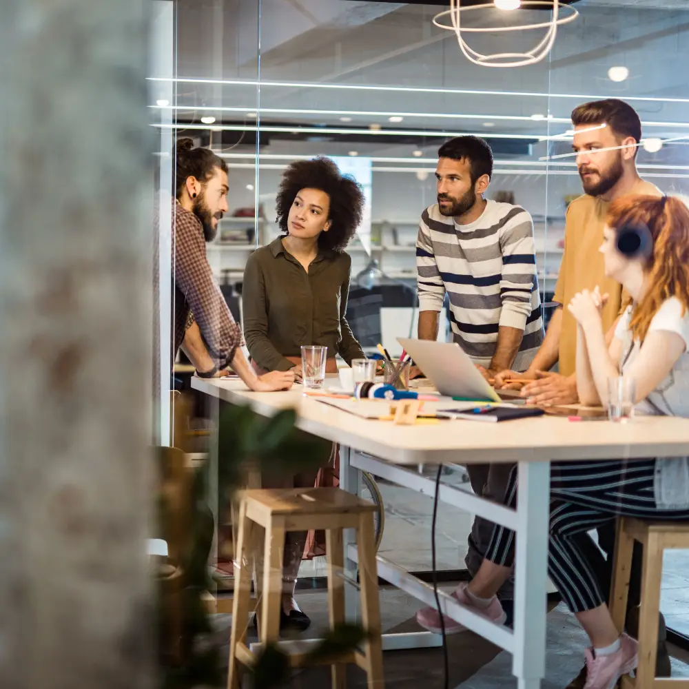 Group of people in office wearing casual dress