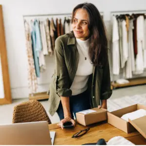 Woman in shop with packages